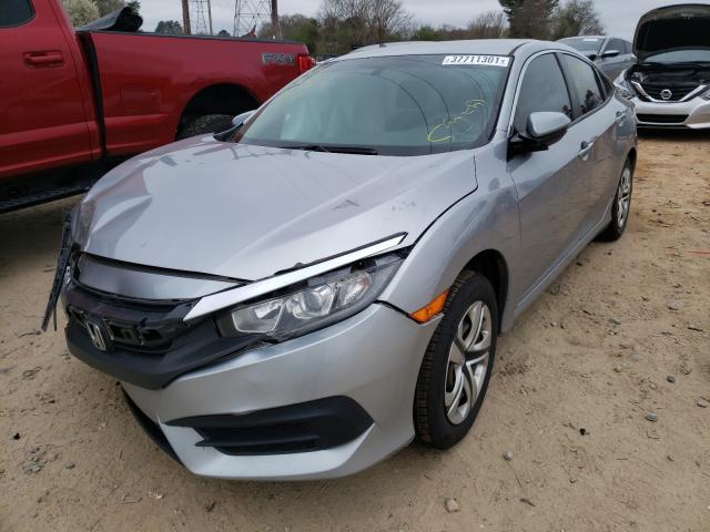 Photo 1 VIN: 19XFC2F5XGE068386 - HONDA CIVIC LX 