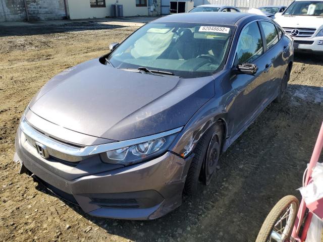 Photo 1 VIN: 19XFC2F5XGE073068 - HONDA CIVIC LX 