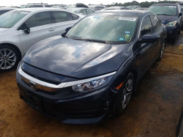 Photo 1 VIN: 19XFC2F5XGE083079 - HONDA CIVIC LX 