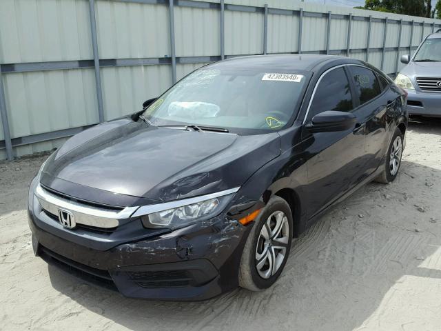 Photo 1 VIN: 19XFC2F5XGE089741 - HONDA CIVIC LX 