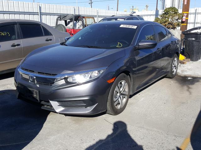 Photo 1 VIN: 19XFC2F5XGE208730 - HONDA CIVIC LX 