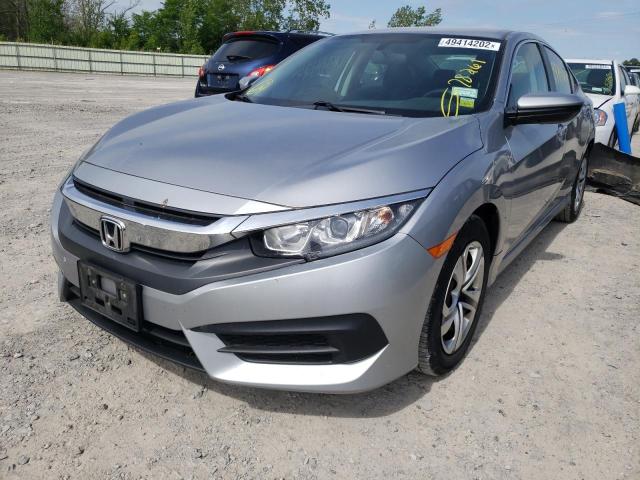 Photo 1 VIN: 19XFC2F5XGE209621 - HONDA CIVIC LX 