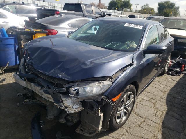 Photo 1 VIN: 19XFC2F5XGE242747 - HONDA CIVIC LX 