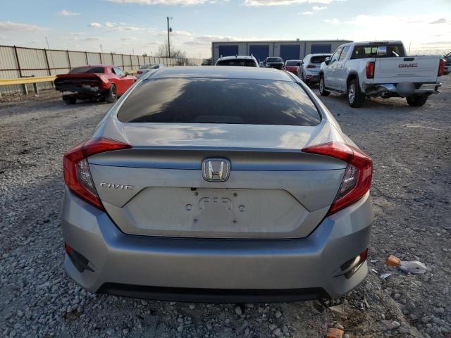 Photo 5 VIN: 19XFC2F5XGE245499 - HONDA CIVIC LX 