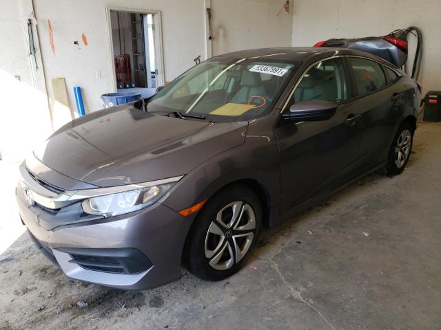 Photo 1 VIN: 19XFC2F5XHE000901 - HONDA CIVIC LX 