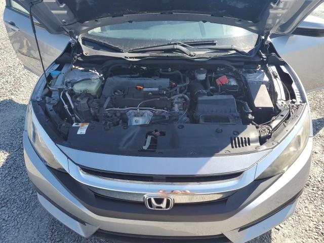 Photo 10 VIN: 19XFC2F5XHE023501 - HONDA CIVIC LX 