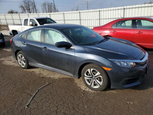 Photo 3 VIN: 19XFC2F5XHE027984 - HONDA CIVIC LX 