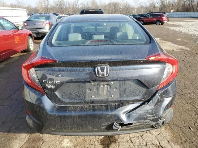 Photo 5 VIN: 19XFC2F5XHE027984 - HONDA CIVIC LX 