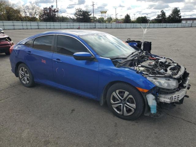 Photo 3 VIN: 19XFC2F5XHE033347 - HONDA CIVIC LX 