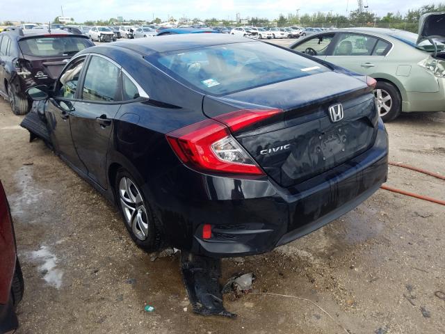 Photo 2 VIN: 19XFC2F5XHE050794 - HONDA CIVIC LX 