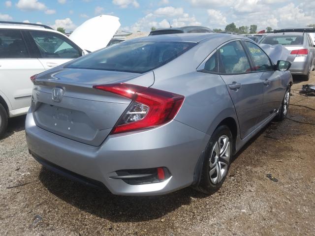 Photo 3 VIN: 19XFC2F5XHE064209 - HONDA CIVIC LX 