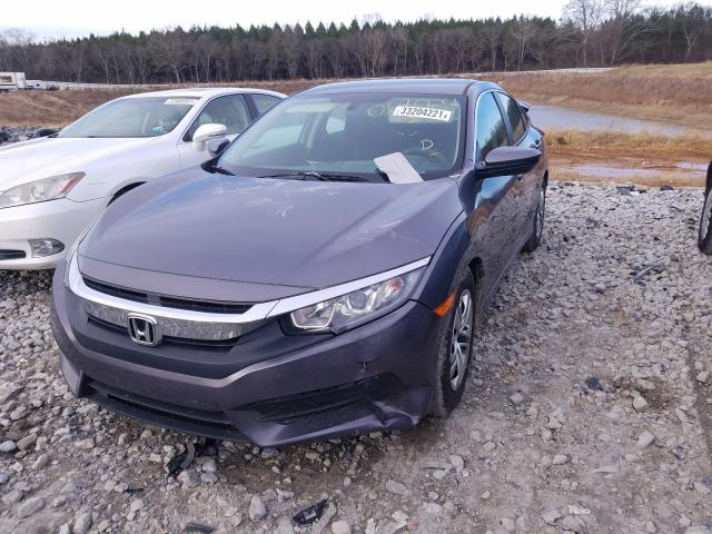 Photo 1 VIN: 19XFC2F5XHE068079 - HONDA CIVIC LX 