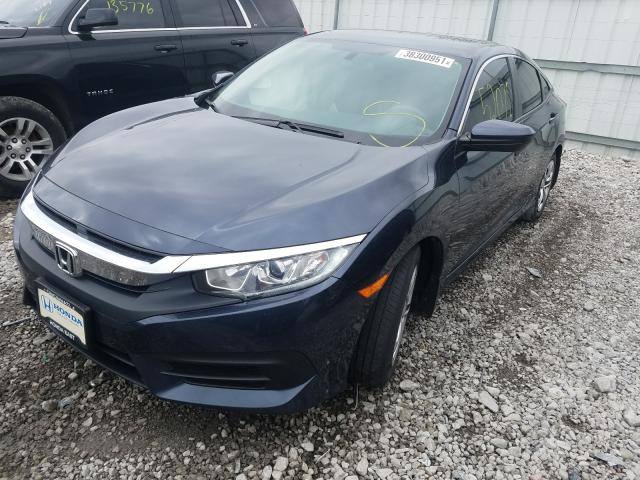 Photo 1 VIN: 19XFC2F5XHE069149 - HONDA CIVIC LX 