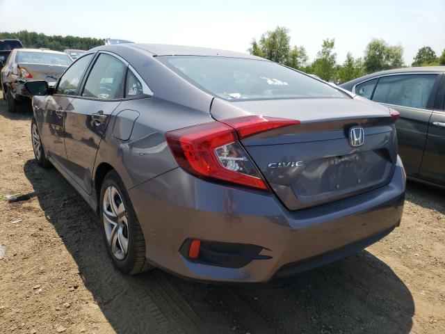 Photo 2 VIN: 19XFC2F5XHE073802 - HONDA CIVIC LX 