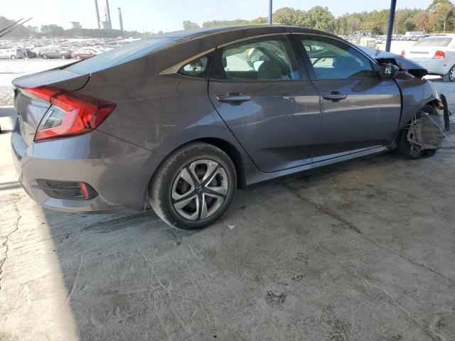 Photo 2 VIN: 19XFC2F5XHE075856 - HONDA CIVIC LX 