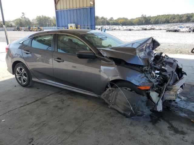 Photo 3 VIN: 19XFC2F5XHE075856 - HONDA CIVIC LX 