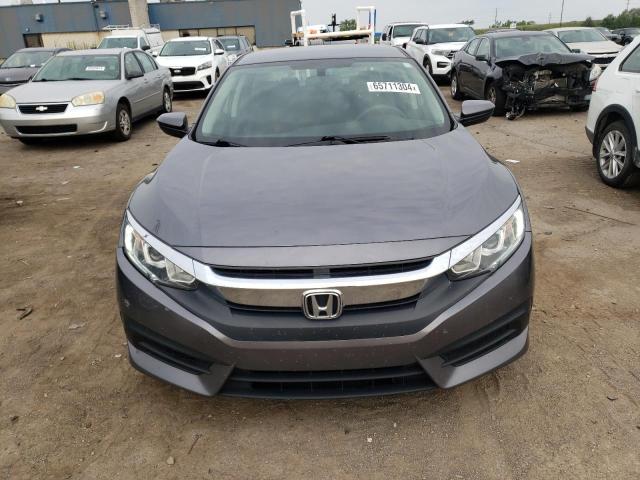 Photo 4 VIN: 19XFC2F5XJE041759 - HONDA CIVIC LX 