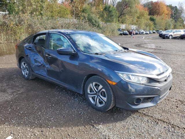 Photo 3 VIN: 19XFC2F62JE203554 - HONDA CIVIC LX 