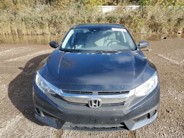 Photo 4 VIN: 19XFC2F62JE203554 - HONDA CIVIC LX 