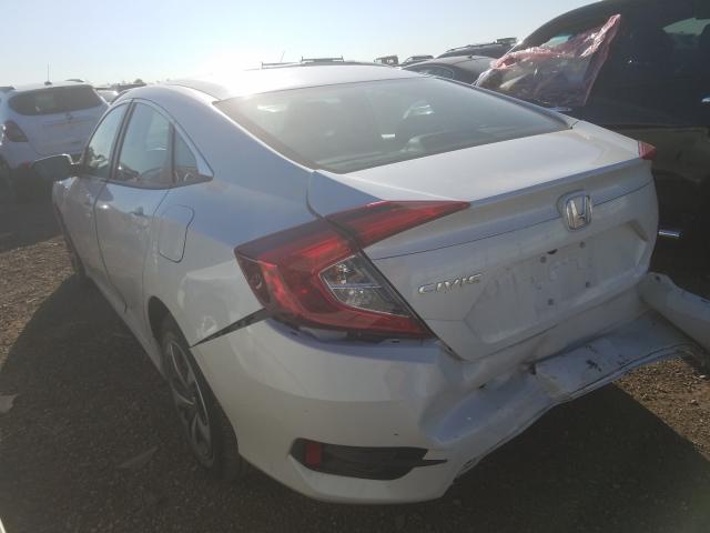 Photo 2 VIN: 19XFC2F63KE013134 - HONDA CIVIC LX 