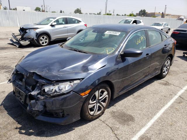 Photo 1 VIN: 19XFC2F68JE021101 - HONDA CIVIC LX 