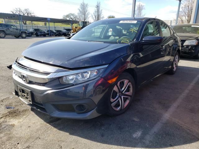 Photo 1 VIN: 19XFC2F6XHE229300 - HONDA CIVIC LX 