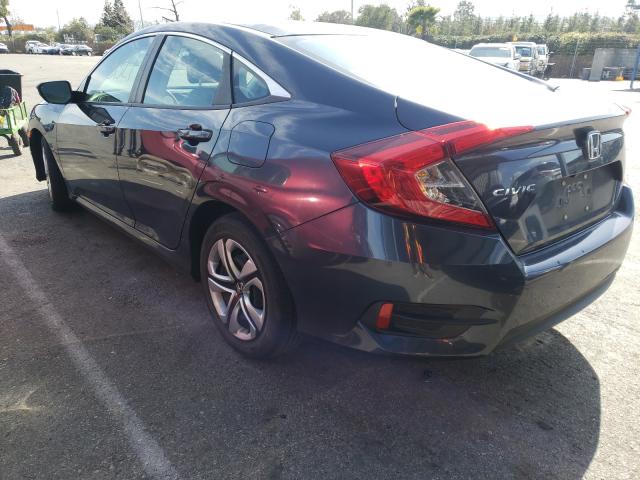 Photo 2 VIN: 19XFC2F6XHE229300 - HONDA CIVIC LX 