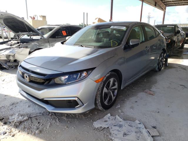 Photo 1 VIN: 19XFC2F6XKE011090 - HONDA CIVIC LX 