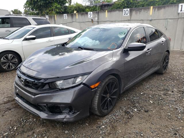 Photo 1 VIN: 19XFC2F6XKE028620 - HONDA CIVIC LX 