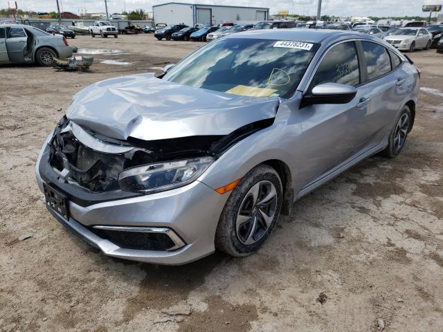 Photo 1 VIN: 19XFC2F6XKE030318 - HONDA CIVIC LX 