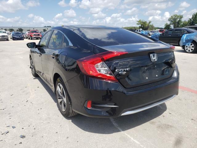 Photo 2 VIN: 19XFC2F6XKE045403 - HONDA CIVIC LX 