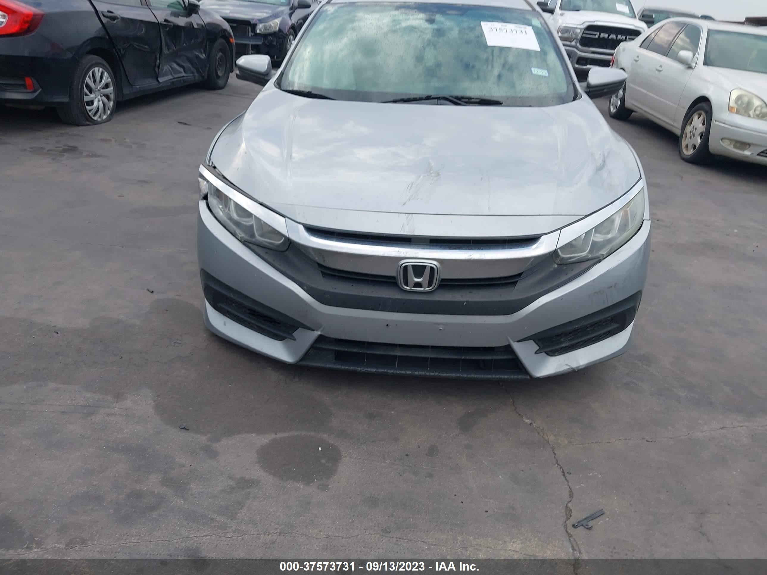 Photo 11 VIN: 19XFC2F70GE027959 - HONDA CIVIC 