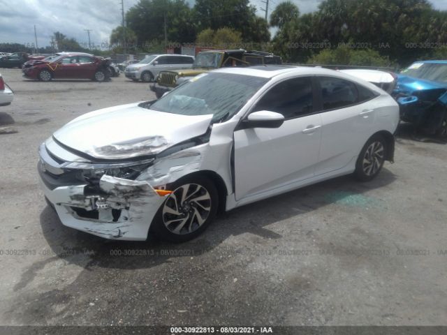 Photo 1 VIN: 19XFC2F71HE054427 - HONDA CIVIC SEDAN 