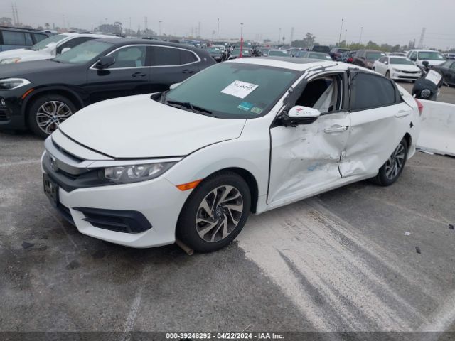 Photo 1 VIN: 19XFC2F74HE210556 - HONDA CIVIC 