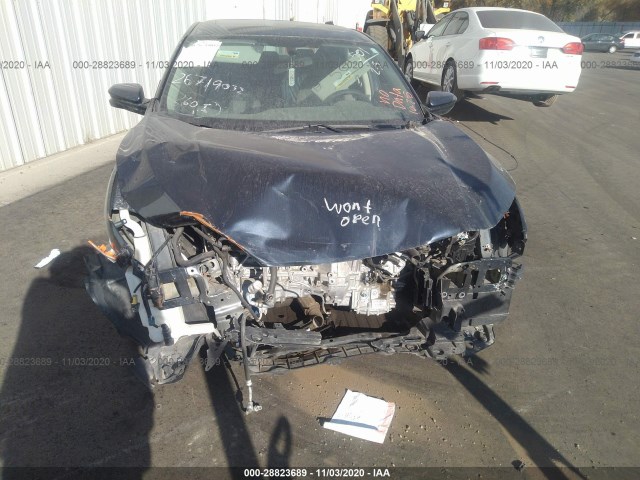 Photo 5 VIN: 19XFC2F77JE010809 - HONDA CIVIC SEDAN 