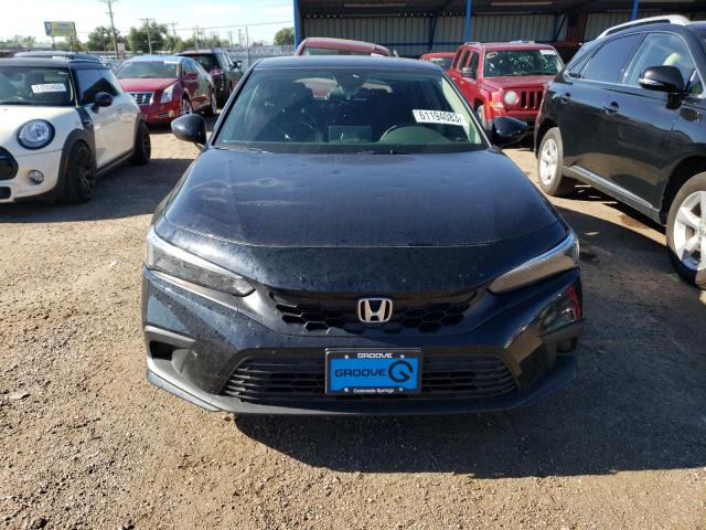 Photo 4 VIN: 19XFL2H5XPE013336 - HONDA CIVIC LX 