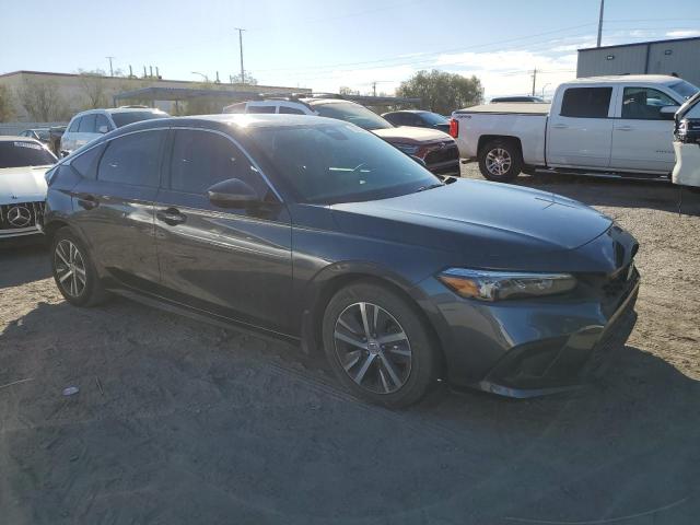 Photo 3 VIN: 19XFL2H5XPE020139 - HONDA CIVIC LX 