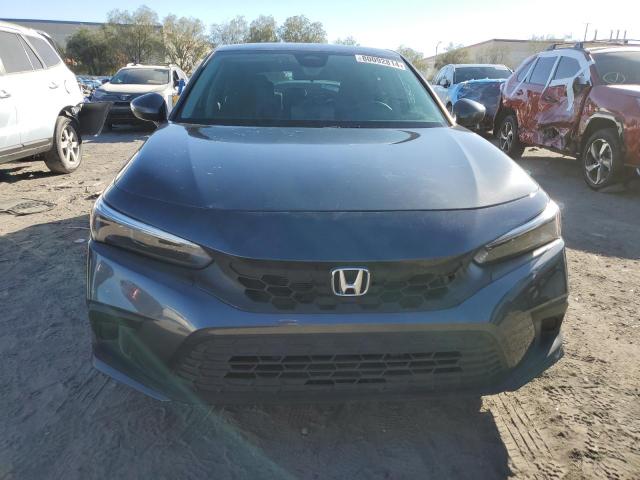 Photo 4 VIN: 19XFL2H5XPE020139 - HONDA CIVIC LX 