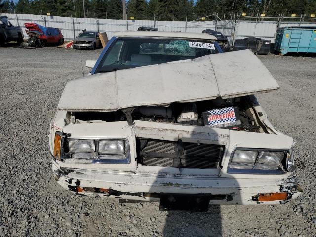 Photo 4 VIN: 1C3BC55E5GG283860 - CHRYSLER LEBARON 