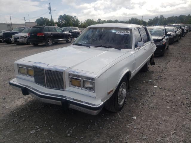 Photo 1 VIN: 1C3XM66P7KW322326 - CHRYSLER FIFTH AVEN 