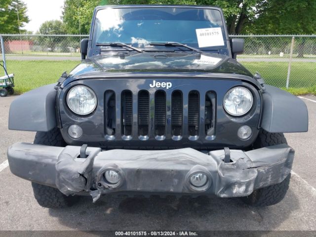 Photo 5 VIN: 1C4AJWAG8GL104700 - JEEP WRANGLER 