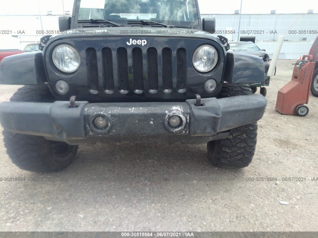 Photo 5 VIN: 1C4AJWBG3EL314567 - JEEP WRANGLER 