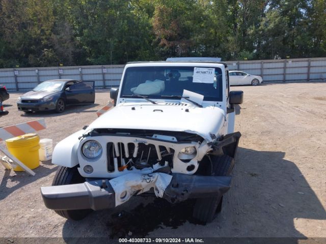 Photo 5 VIN: 1C4AJWBG5GL128645 - JEEP WRANGLER 