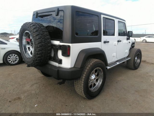 Photo 3 VIN: 1C4BJWDG0EL233317 - JEEP WRANGLER UNLIMITED 