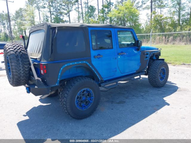 Photo 3 VIN: 1C4BJWDG0FL744401 - JEEP WRANGLER UNLIMITED 