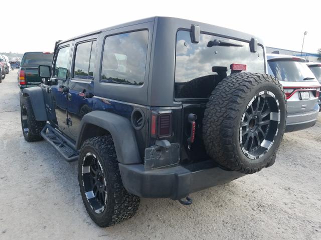 Photo 2 VIN: 1C4BJWDG1GL138560 - JEEP WRANGLER U 