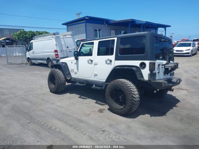 Photo 2 VIN: 1C4BJWDG1GL219008 - JEEP WRANGLER UNLIMITED 