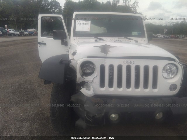 Photo 5 VIN: 1C4BJWDG2EL208600 - JEEP WRANGLER UNLIMITED 