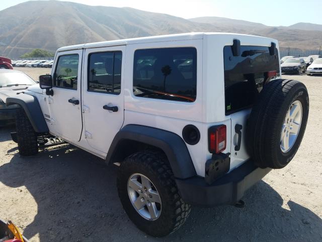 Photo 2 VIN: 1C4BJWDG2EL308521 - JEEP WRANGLER U 