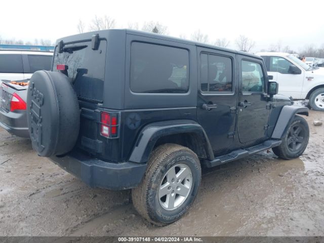 Photo 3 VIN: 1C4BJWDG2GL194118 - JEEP WRANGLER UNLIMITED 